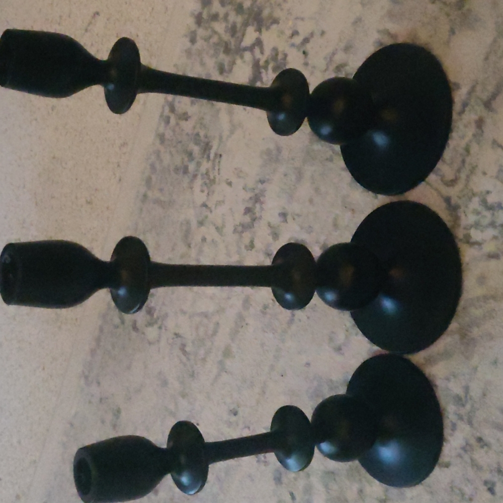 Three black candle holders